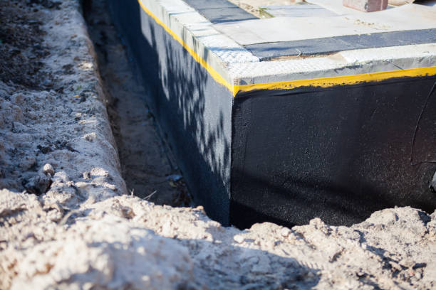 Professional Basement Waterproofing technician working in Spring City, PA